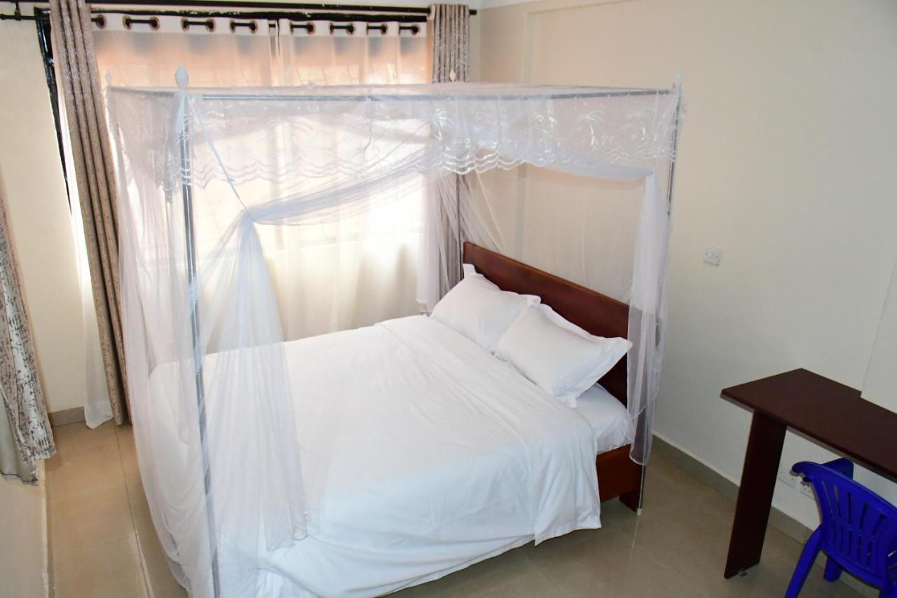 Golden Cherries Guest House Jinja Bagian luar foto